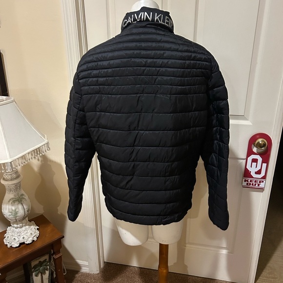 Calvin Klein Packable Puffer Black Jacket. Carry pouch attached. Nearly new Med. - Picture 5 of 12